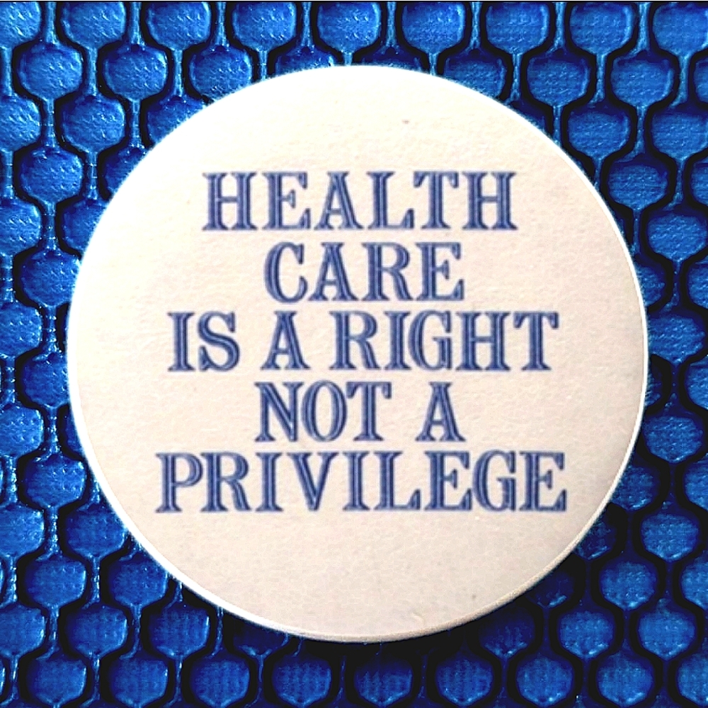 2.25 inch healthcare is a right button badge pin